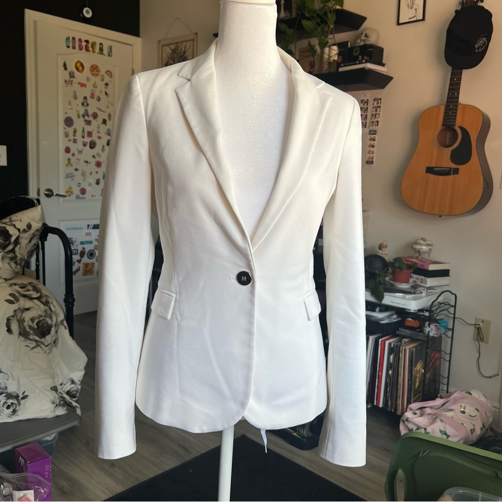 Cute womens white blazer!